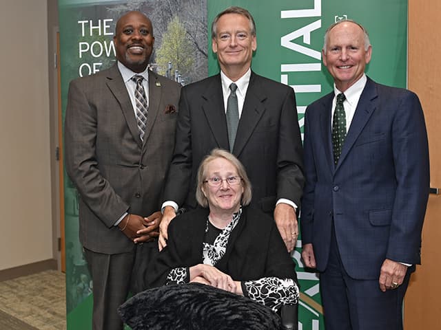 Christine and Joe Price with Kevin Bailey and Chancellor Dubois