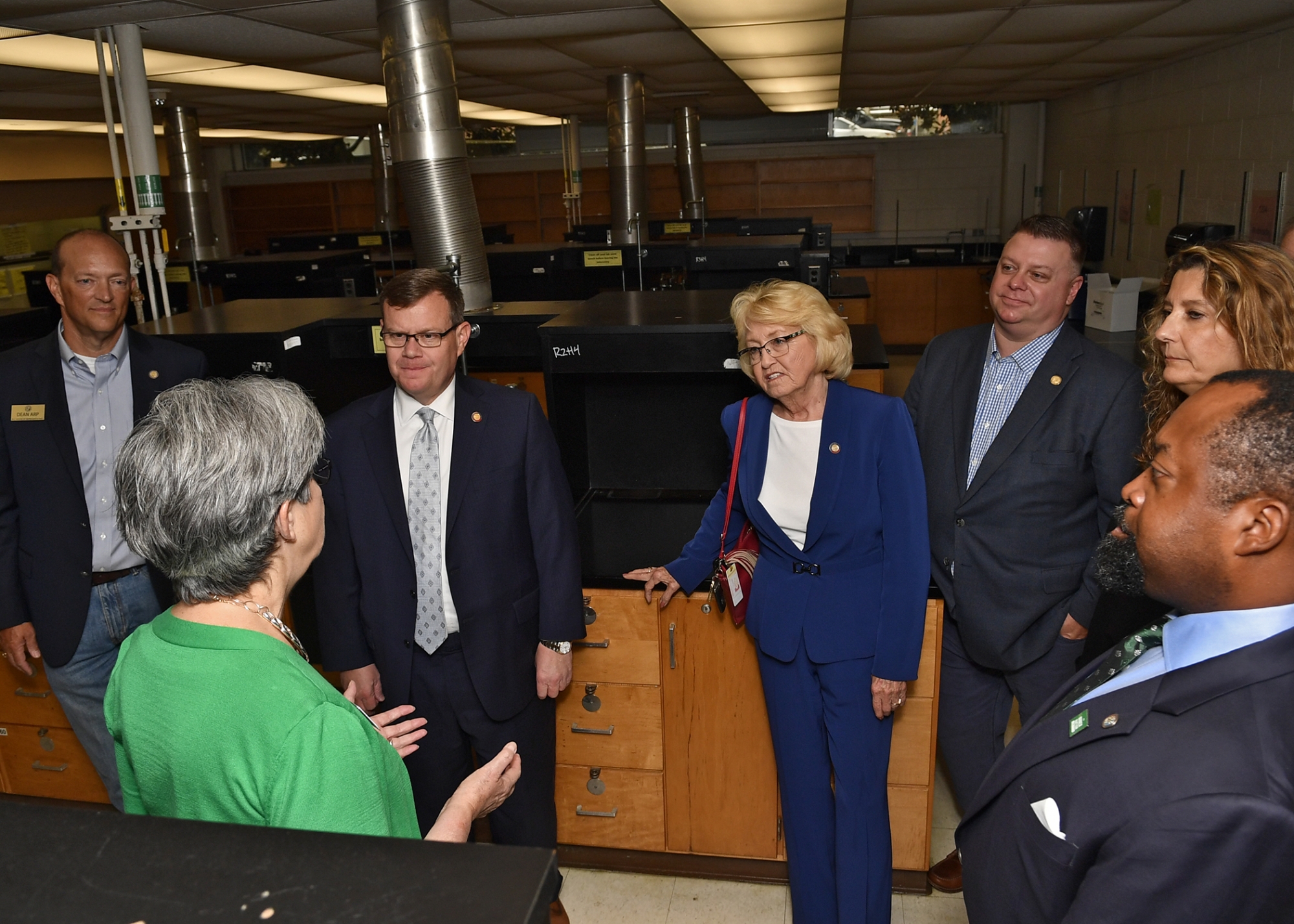  Provost Joan Lorden discusses pending renovations to the Burson and Cameron science buildings with North Carolina Representatives Dean Arp ’99, House Speaker Tim Moore, Linda Johnson, Jason Saine ’95, Chemistry Chair Bernadette Donovan-Merkert and UNC Charlotte Trustee Teross Young ’93